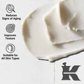 Krupni plan teksture kreme Age Defender Eye Repair; smanjuje znakove starenja i poboljšava teksturu, pogodno za sve tipove kože.