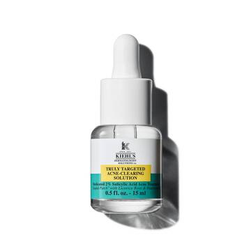 Bočica od 15 ml Kiehl's Truly-Targeted Blemish-Clearing Solution na beloj pozadini.