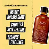 A graphic featuring a bottle of Kiehl's Ferulic Brew Facial Essence . On the left, the text "Antioxidant treatment" is at the top, followed by three text boxes: "VISIBLY BOOSTS GLOW," "SMOOTHS SKIN TEXTURE," and "REDUCES FINE LINES."