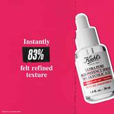 Bočica Ultra Pure 9.8% Glycolic Acid Serum na ružičastoj pozadini sa tekstom: „Trenutno je 83% osetilo poboljšanu teksturu.”